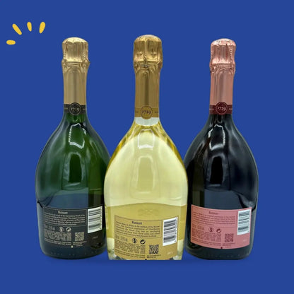 Dos des bouteilles Ruinart Brut, Blanc de Blancs et Rosé avec contre-étiquettes